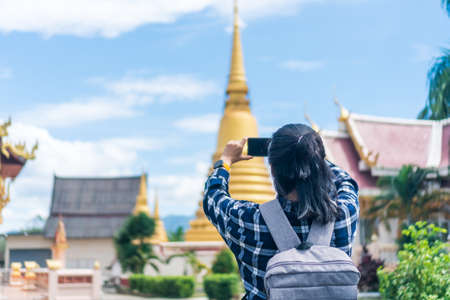 Woman travel around the world with backpack freedom and relax life concept.の写真素材