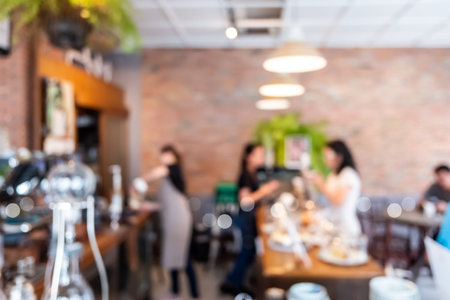 Blur coffee and restutant cafe with customers background vintage tone color style.