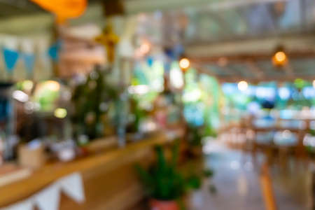Blur coffee and restutant cafe with customers background vintage tone color style.の写真素材