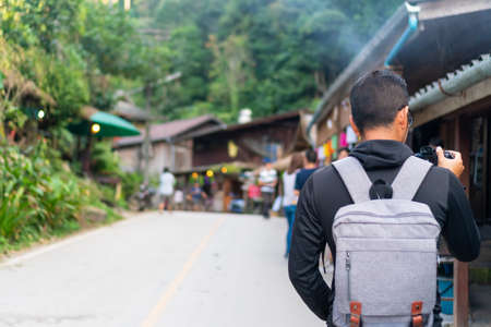 Man travel around the world with backpack freedom and relax life concept.の写真素材