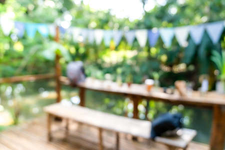 Blur coffee and restutant cafe with customers background vintage tone color style.の写真素材