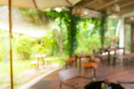 Blur coffee and restutant cafe with customers background.
