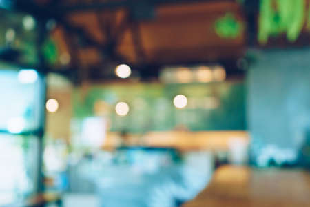 Blur coffee and restutant cafe with customers background vintage tone color style.の写真素材