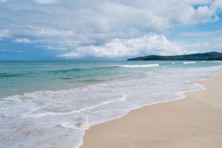 Tropical nature clean beach and white sand in summer with sun light blue sky.の写真素材