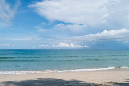 Tropical nature clean beach and white sand in summer with sun light blue sky.の写真素材