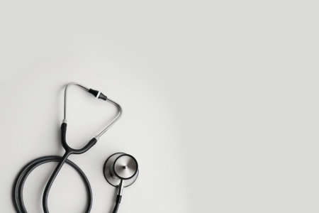 Top view of stethoscope on color  background with empty copy space, flat design. Health medical concept.の素材