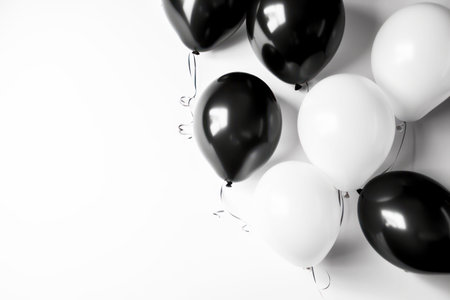 Black and white balloon on white background with copy space.の素材