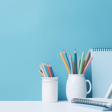 Back to school stationery on empty copy space on color background.の素材