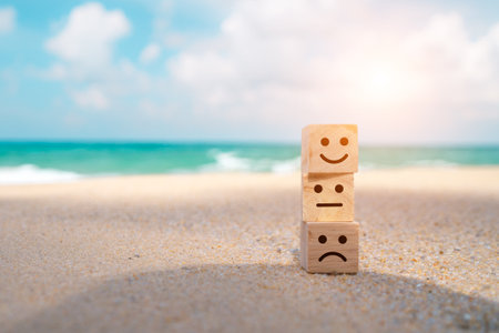 Smile face icon on a wooden cube for Customer service evaluation customer satisfaction level and satisfaction survey concept.の写真素材