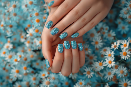 Woman hands with trendy polish manicure on background.の素材
