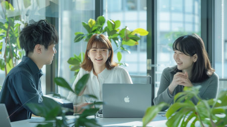 A company is having an open meeting employees in the conference room.の素材