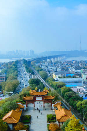 Stand in the yellow crane tower overlooking Yangtze River Bridgeのeditorial素材