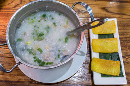 Minced pork congee with preserved eggの写真素材