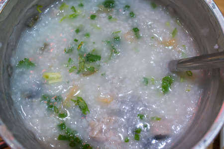 Minced pork congee with preserved eggの写真素材