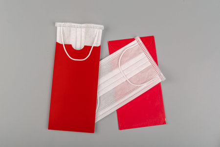 Red envelopes with disposable white masks