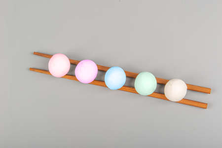 Different colored raw tangyuan on chopsticksの写真素材