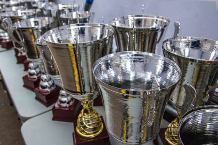 Moscow, Russia - Apr 18, 2015: Trophy cups stand on the table at the Rally Masters Show 2015 at the Krylatskoye District.のeditorial素材