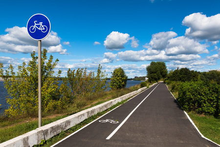 Bicycle road on a riverwalk along the Volga River in the city of Dubna, Moscow Oblast, Russia.