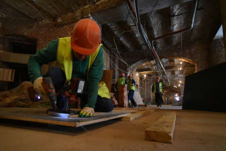 Moscow, Russia - 7 Feb, 2019: Repair workers in the Polytechnic Museum during the renovation in Moscow, Russia.のeditorial素材