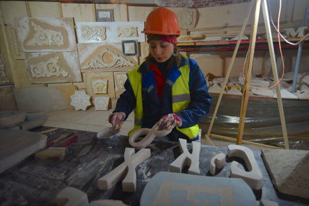 Moscow, Russia - 7 Feb, 2019: Repair worker in the Polytechnic Museum during the renovation in...
