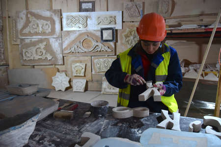 Moscow, Russia - 7 Feb, 2019: Repair worker in the Polytechnic Museum during the renovation in Moscow, Russia.のeditorial素材