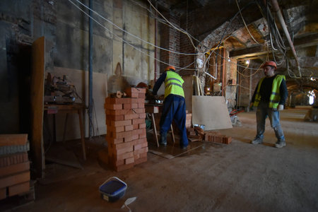 Moscow, Russia - 7 Feb, 2019: Repair workers in the Polytechnic Museum during the renovation in...