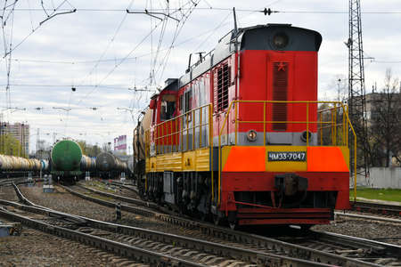 Moscow, Russia. 2nd May, 2020. Locomotive with oil tank cars in Moscow, Russia.のeditorial素材