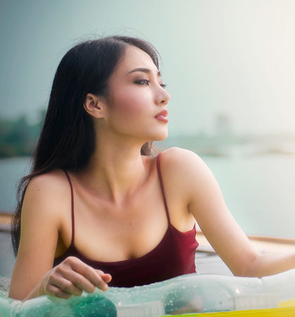 women and pool  morning Laosの写真素材