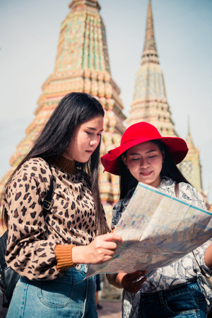 Young tourist traveling in Thai temple Bangkok, Thailandの写真素材