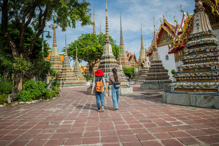 Young tourist traveling in Thai temple Bangkok, Thailandの写真素材