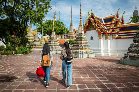 Young tourist traveling in Thai temple Bangkok, Thailandの写真素材