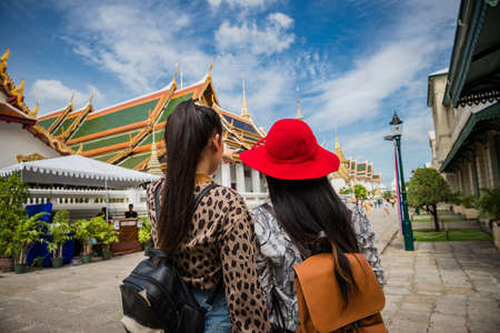 Young tourist traveling in Thai temple Bangkok, Thailandの写真素材