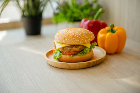 Popular fast food hamburgers placed on the table and served with a drink.の写真素材