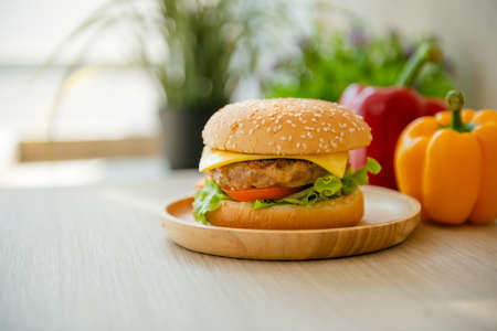 Popular fast food hamburgers placed on the table and served with a drink.の写真素材