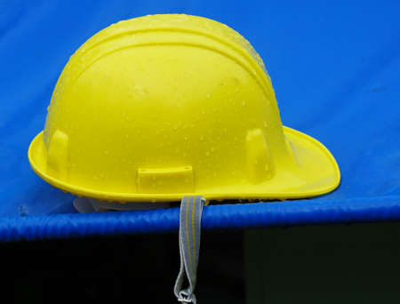 Yellow worker helmet for safety firstの写真素材