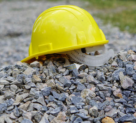 Yellow worker helmet for safety firstの写真素材