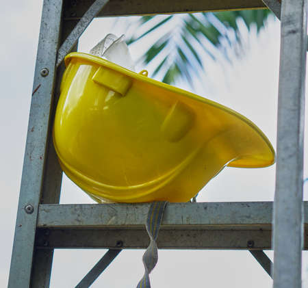Yellow worker helmet for safety firstの写真素材