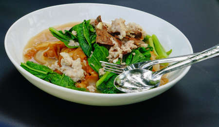 Fried noodle with pork and Kale is very Nice to eatの写真素材