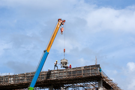 Construction site with crane and workers