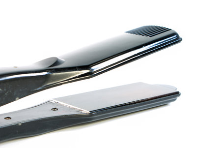 Iron for hair - straightener, isolated on the white background