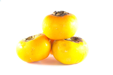 persimmon fruit on white backgroundの写真素材