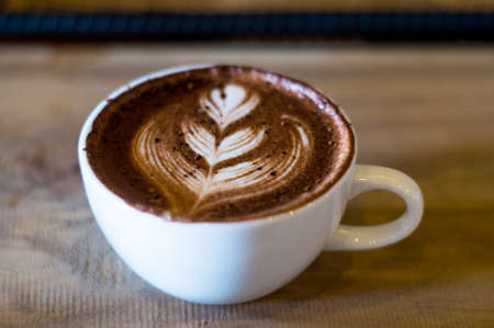 hot mocha serving on wooden tableの写真素材