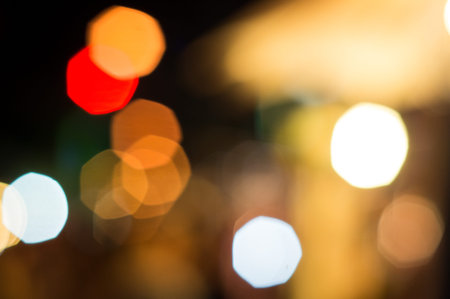 Blurred defocused lights background of city at night