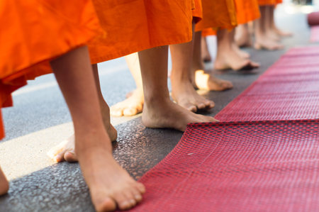 Feet of walking monks