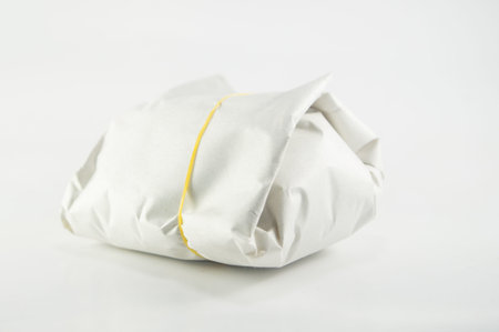 Food wrap in paper with elastic rubber, Wrapping food in thailand