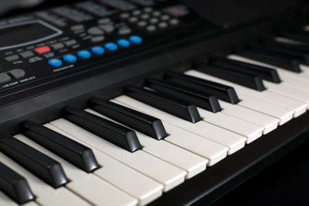 Close up shot of black & white piano keysの写真素材