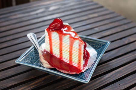 Strawberry cheese cake on wood tableの写真素材