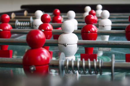 Closeup football table game with red and white player.の写真素材