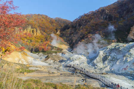 Noboribetsu Onsen is Hokkaido's most famous hot spring resort. A large amount of Noboribetsu's many types of hot spring water surfaces in the spectacular Jigokudani orの写真素材
