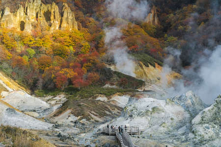 Noboribetsu Onsen is Hokkaido's most famous hot spring resort. A large amount of Noboribetsu's many types of hot spring water surfaces in the spectacular Jigokudani orの写真素材